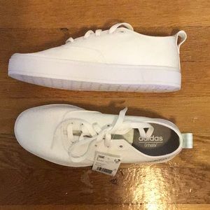Brand new white adidas shows
